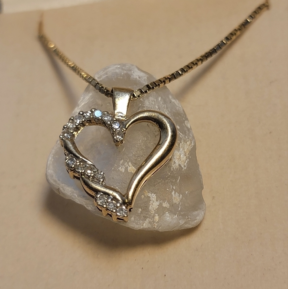10K gold heart pendant wrapped in diamonds, necklace with box chain.